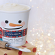 Pint of frosting on wintry background
